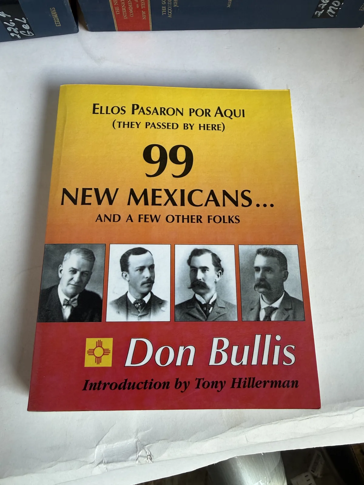 Cover of Ellos Pasaron por Aqui, 99 New Mexicans and a Few Other Folks by Don Bullis with an introduction by Tony Hillerman, with portraits of historic New Mexicans, photographed at New Mexico Literacy Project