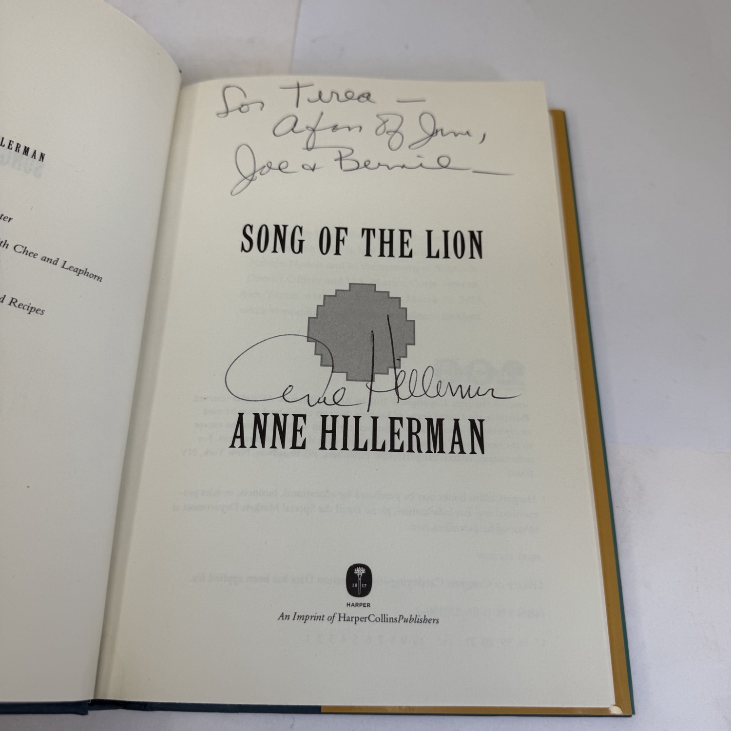 Title page of Song of the Lion signed and inscribed by Anne Hillerman — reads 'For Teresa — A fan of Jim, Joe and Bernie — Anne Hillerman' with full signature below, Harper colophon at bottom