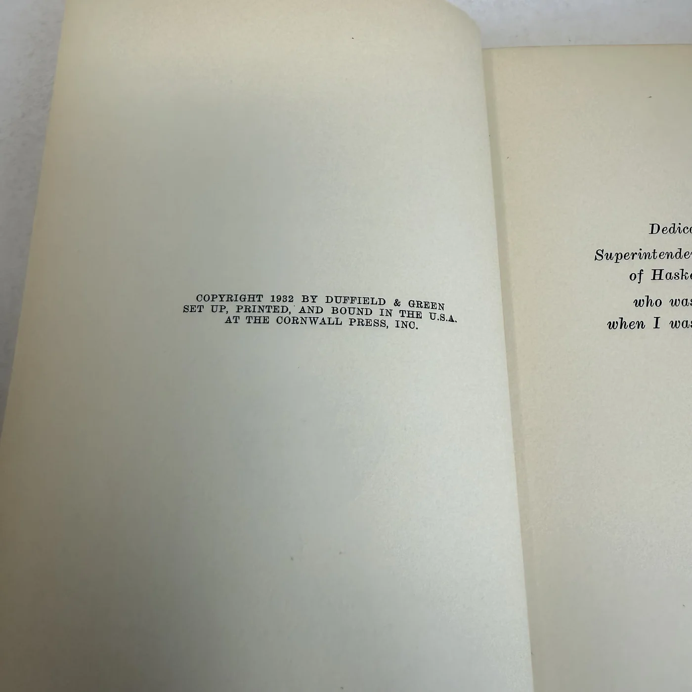 The copyright page reading COPYRIGHT 1932 BY DUFFIELD & GREEN, SET UP, PRINTED, AND BOUND IN THE U.S.A. AT THE CORNWALL PRESS, INC., facing the dedication leaf to a superintendent of Haskell Institute.