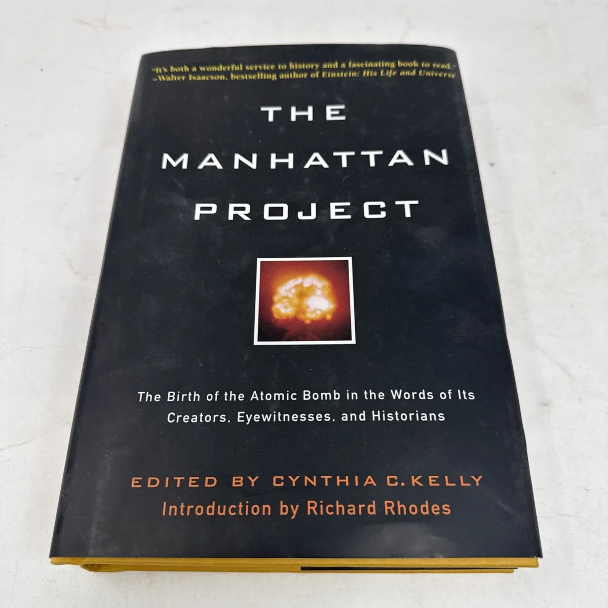Black hardcover dust jacket of The Manhattan Project edited by Cynthia C. Kelly with mushroom cloud cover photo, Black Dog and Leventhal 2007 first edition signed presentation copy