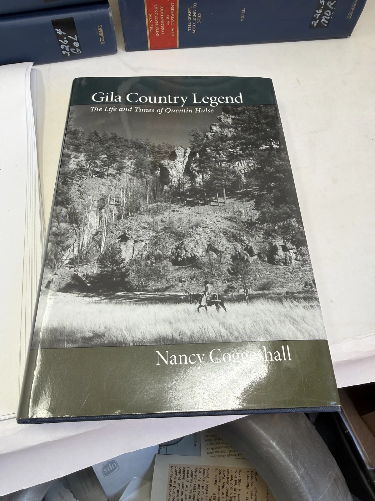Cover of Gila Country Legend, the life and times of Quentin Hulse, by Nancy Coggeshall, with a photograph of a rider in the Gila high country, photographed at New Mexico Literacy Project