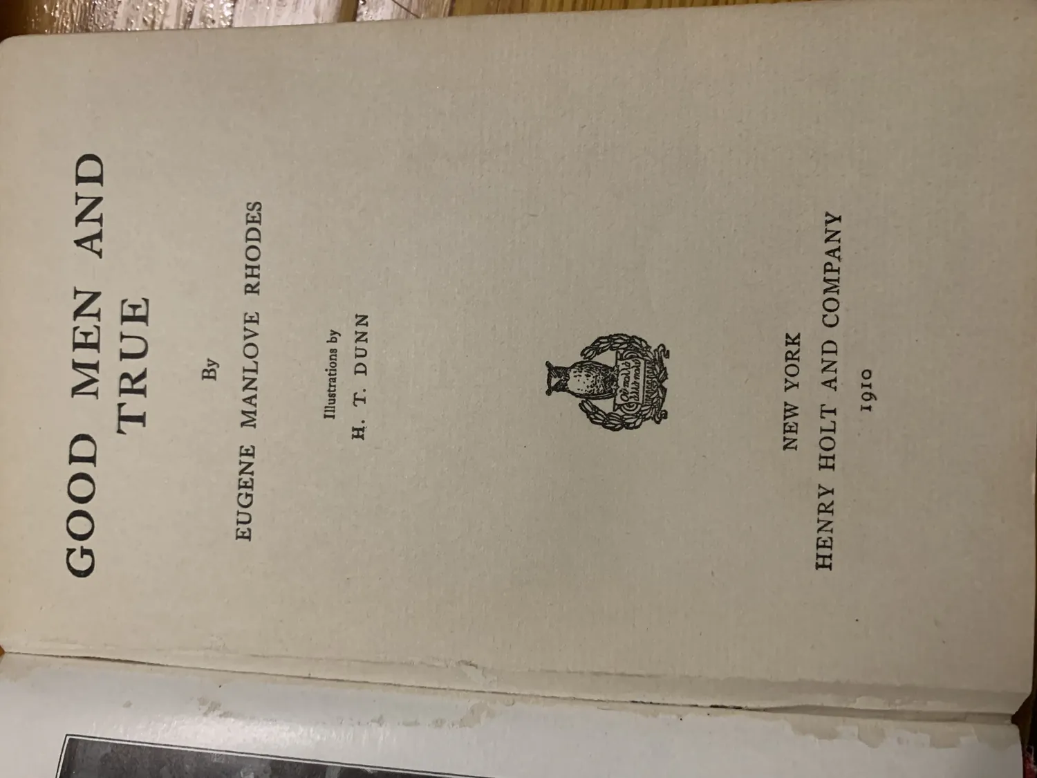 Title page of Good Men and True by Eugene Manlove Rhodes with illustrations by H. T. Dunn, New York Henry Holt and Company 1910, showing the Henry Holt colophon confirming the first edition imprint