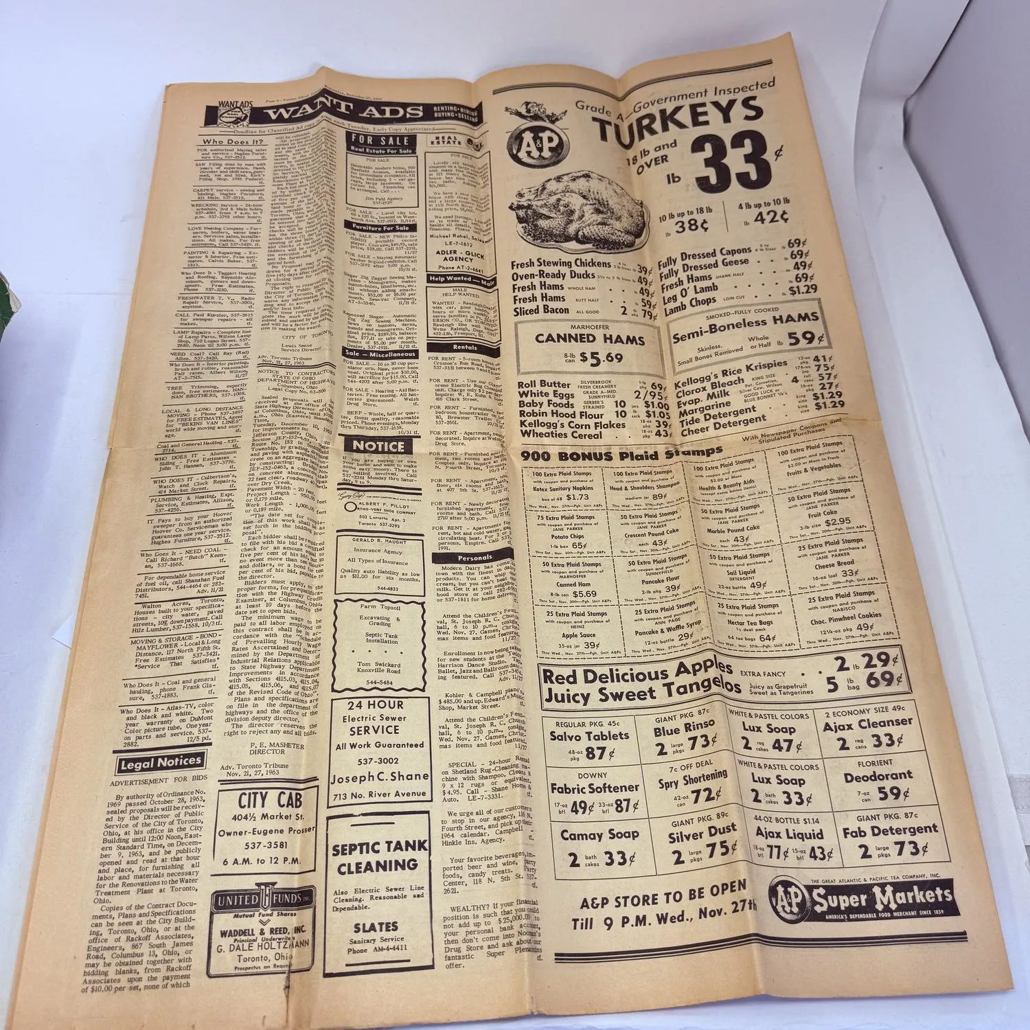 A&P Super Markets full-page advertisement from the Toronto Tribune November 27 1963 showing turkeys at 33 cents per pound, canned hams at $5.49, want ads, classified listings, legal notices, City Cab advertisement, and Septic Tank Cleaning service ad. 1963 grocery prices frozen in time in a small Ohio town newspaper.