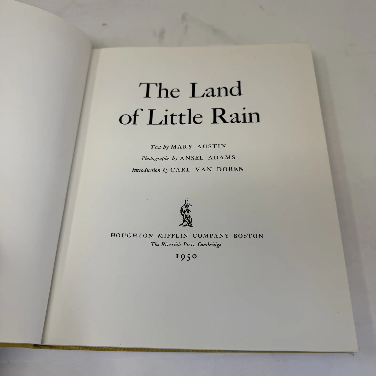 Title page of The Land of Little Rain reading Text by Mary Austin, Photographs by Ansel Adams, Introduction by Carl Van Doren, Houghton Mifflin Company Boston, The Riverside Press Cambridge 1950, photographed at New Mexico Literacy Project