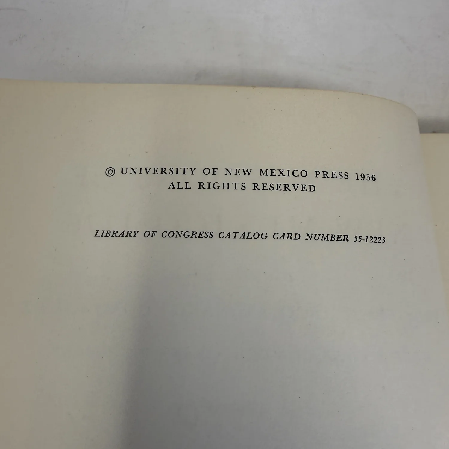 Copyright page of The Missions of New Mexico, 1776 reading University of New Mexico Press 1956 and Library of Congress Catalog Card Number 55-12223, photographed at New Mexico Literacy Project
