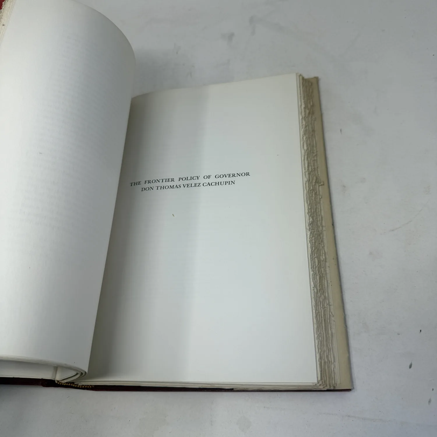 Section title page reading The Frontier Policy of Governor Don Thomas Velez Cachupin in The Plains Indians and New Mexico 1751-1778, with rough-cut page edges, photographed at New Mexico Literacy Project